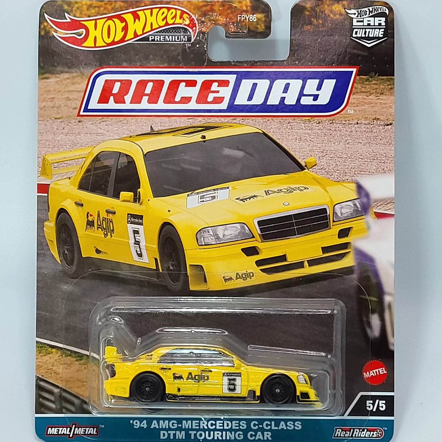 Hot Wheels '94 AMG-Mercedes C-Class DTM Touring Car in silver with racing livery, part of the Premium Race Day series