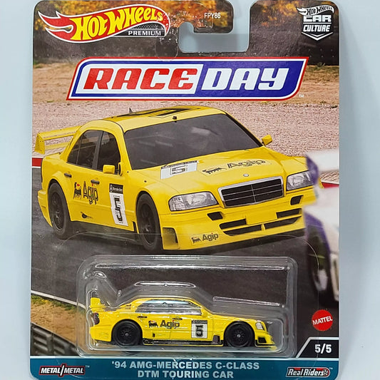 Hot Wheels '94 AMG-Mercedes C-Class DTM Touring Car in silver with racing livery, part of the Premium Race Day series