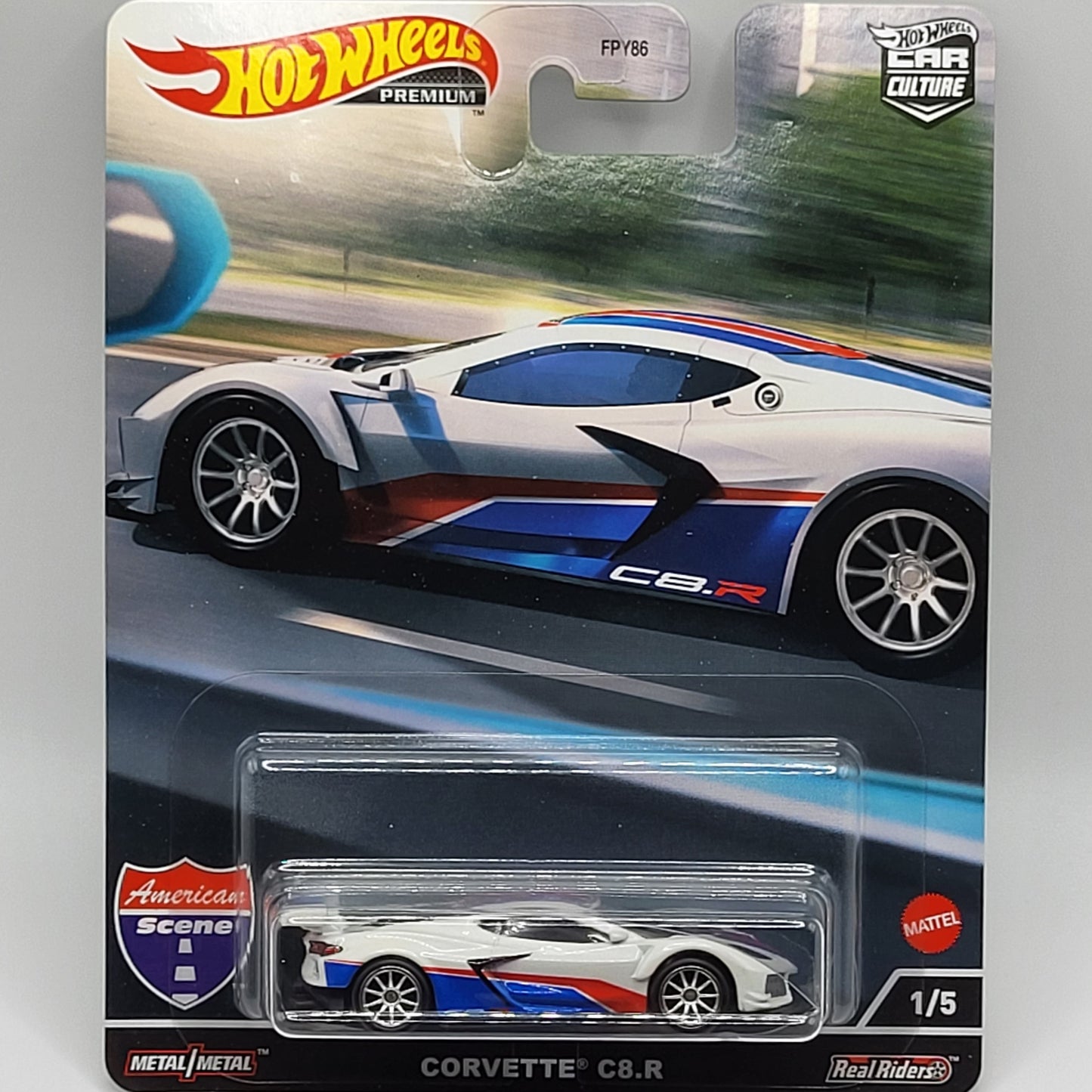 Hot Wheels Corvette C8.R in silver with racing stripes, part of the Premium Car Culture American Scene series