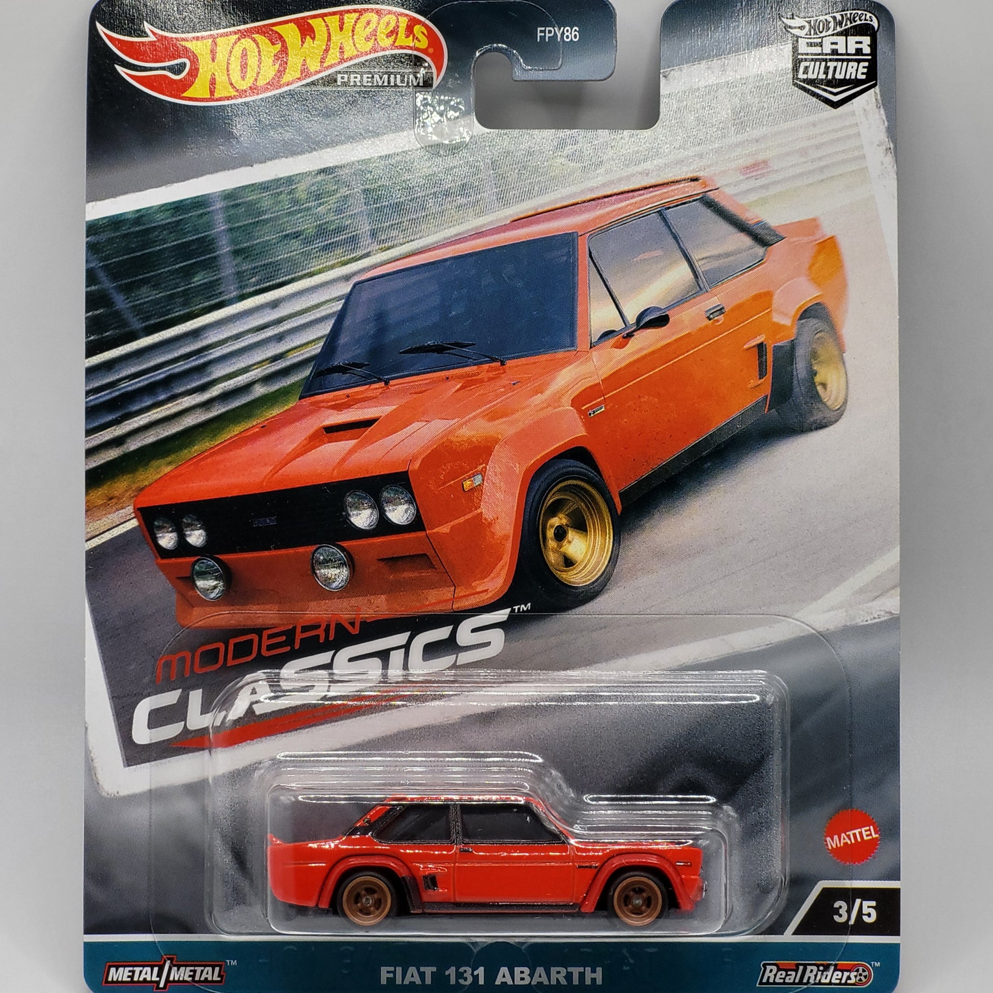 Hot Wheels Fiat 131 Abarth in white with rally stripes, part of the Premium Modern Classics series, case FPY86 959E